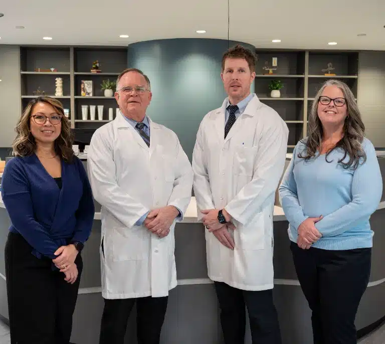 Doctors and patient care team at Prohealth Chiropractic Rockville, MD, welcoming patients to expert chiropractic care and spinal health services